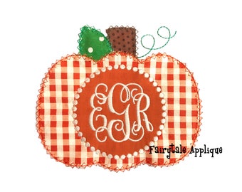 May include: A red and white gingham pumpkin with a brown stem and green leaves. The pumpkin has a circle in the center with the monogram "EGR" embroidered in white.