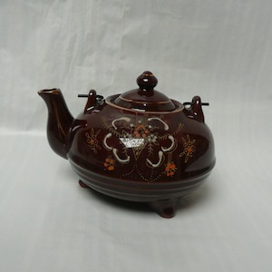 Vintage redware Hand Painted Japanese Moriage Pattern Footed Teapot with Wire Handle and Floral Design
