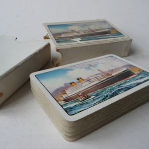 Vintage travel set of Dominion Monarch Ocean Cruiser Playing Cards by John Waddington of Leeds and London in Original box