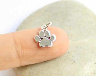 Sterling Silver Paw outline charm Sterling Silver Paw outline charm