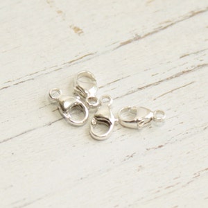 Sterling Silver Lobster Clasps -- 8mm Oval -- Four Pieces