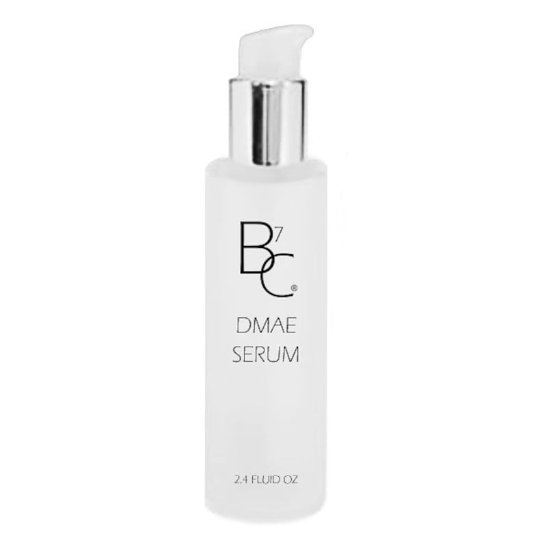 May include: A white bottle with a silver pump top and black text that reads "B7C DMAE SERUM 2.4 FLUID OZ".