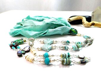 Aquagroene sari-ketting met zijden kwastje - kristalparels, schelpen, edelstenen