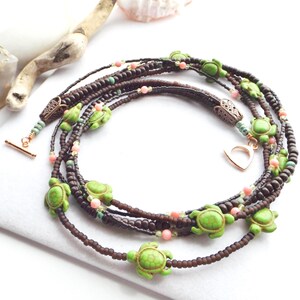 Beaded Turtle Statement Necklace: A Vibrant Multi-Strand Boho Masterpiece adorned with Brown, Green, & Pink Gemstones - Unique Gift for Her