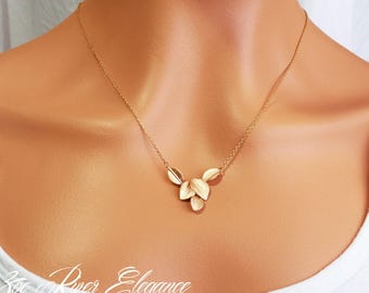 Choose silver or gold, leaf cluster necklace. Elegant and dainty pendant
