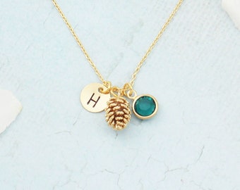 Välj halsband med tallkotte i guld eller silver. Halsband med personliga initialer och födelsestenar. Tallkotte i silver. Hösthalsband