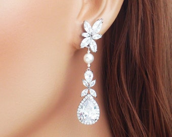 Long silver cubic zirconia bridal earrings. White pearl, clear chandelier large earrings. Zircon diamond rhinestone drop earrings. The Ella