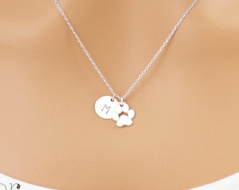 Personalized paw print necklace. Dainty silver paw print and initial necklace