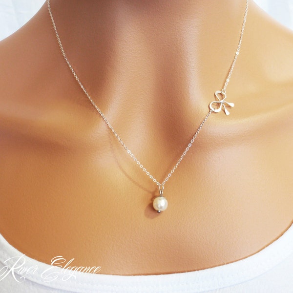 Silver bow and white pearl necklace. Dainty pearl and bow necklace. Elegant pearl necklace