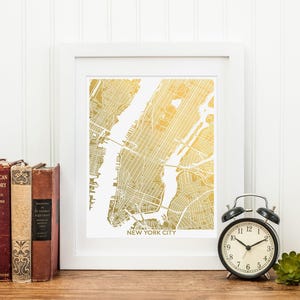 A shiny metallic map of New York City. This listing is shown in gold foil, several other foil colors are also available. Framed options available. Collect several foil maps to make a gallery wall of your favorite cities. Excellent globetrotter gift.