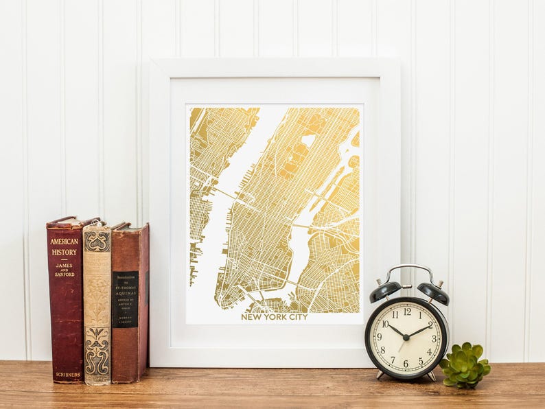 A shiny metallic map of New York City. This listing is shown in gold foil, several other foil colors are also available. Framed options available. Collect several foil maps to make a gallery wall of your favorite cities. Excellent globetrotter gift.