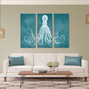 A gallery wrapped, ready to hang octopus triptych in white and acid washed teal. Printed with long lasting pigment inks onto heavyweight canvas and wrapped around kiln dried stretcher bars. Attention grabbing and ideal for homes and offices.