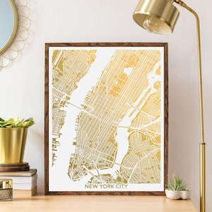 A shiny metallic map of New York City. This listing is shown in gold foil, several other foil colors are also available. Framed options available. Collect several foil maps to make a gallery wall of your favorite cities. Excellent globetrotter gift.