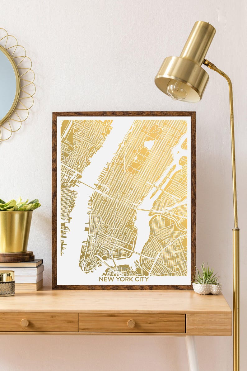 A shiny metallic map of New York City. This listing is shown in gold foil, several other foil colors are also available. Framed options available. Collect several foil maps to make a gallery wall of your favorite cities. Excellent globetrotter gift.