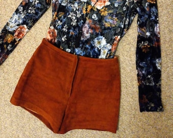 Vintage 1960-1970s rust brown suede leather hot pant shorts.