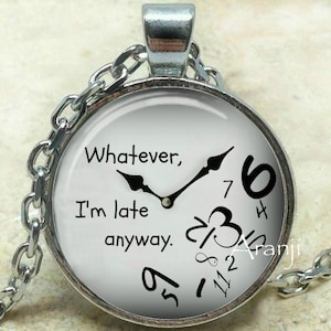 May include: A silver necklace with a round pendant featuring a clock face with the text "Whatever, I'm late anyway." The clock hands are pointing to the numbers 6 and 3.