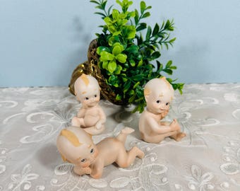 Set of Three Vintage Lefton Bisque Porcelain Kewpie Piano Baby Blue Wings Figurines 02132