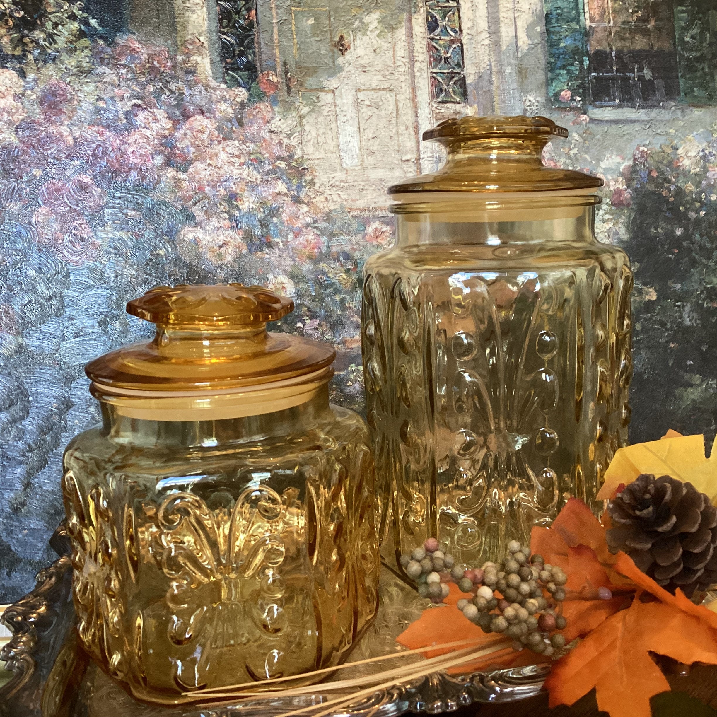 Set of 3 Decorative Glass Canisters With Silver Scroll Lids