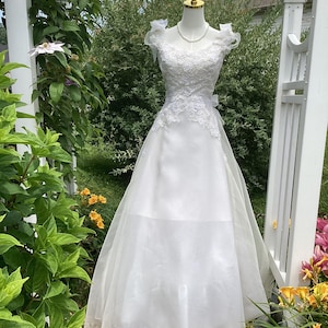 vera wang 90s off shoulder wedding dress with bow stilwhite Call it manifestation, call it obsessionwhatever it is, weve dreamt of having this 1996 Vera Wang wedding dress for so long. (We even bought the matching VW Barbie a few months ago!) Thanks to one