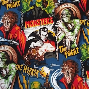 May include: A fabric featuring classic monster movie characters. The design includes Frankenstein's monster, Dracula, the Mummy, and a werewolf, with text that reads "Monsters", "The Fright", and "The Horror". The color palette is dominated by blues, greens, reds, and blacks.