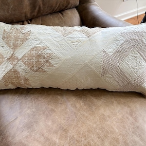 RARE ANTIQUE QUILT on antique grain sack pillow/ quilters signed on different parts of the quilt / adorable reproductions calico back