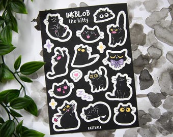 May include: A black sticker sheet featuring various cartoon cat illustrations with white outlines. The stickers include cats in different poses, some with hearts, bows, and flowers. The text "INKBLOB the kitty" is at the top.