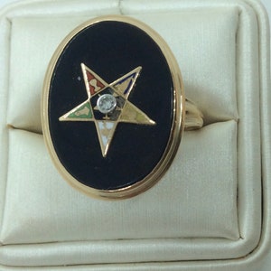 Large eastern star set an onyx ladies ring size 7 gorgeous Diamond center in Enameld Star