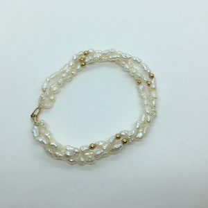 14k Pearl and Gold Bead Bracelet 3 strands twisted or straight.