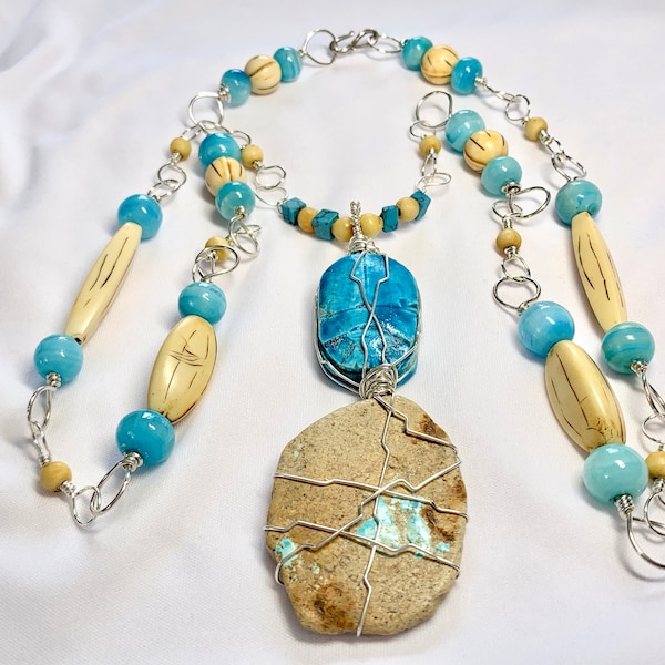 Sterling, Scarab, Cerrillos Turquoise Long Necklace withMexican Indian Bone with Turquoise glass stone hard wired in Sterling silver wire.