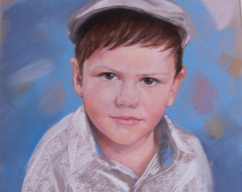 May include: A pastel portrait of a young person wearing a gray newsboy cap and a white button-down shirt. The background is a blend of blue and other pastel colors, creating a soft, artistic effect.