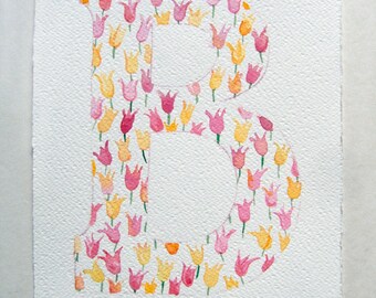 Può includere: Un dipinto ad acquerello della lettera "B" formata da tulipani rosa e gialli.