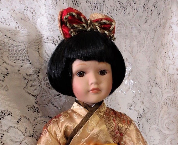 porcelain doll music box