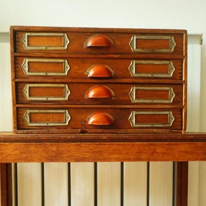 sweet old wood cabinet with drawers Mez Vater antique spool cabinet storage chest display 30's haberdashery