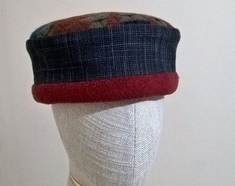 Brimless Fleece Pillbox Hat with an Aztec patterned tip, grey crown and red trim