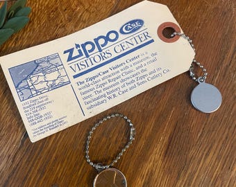 Vintage, Zippo Penny Keychains- 2 Keychains and 1 Visitor Center Tag- 70th Anniversary- 2002