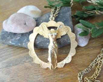 Vintage, Winged Victory of Samothrace- Medallion- Cinerama, Cranston, RI- Gold Toned Metal- Goddess, Witchy- 24 Inch Long Chain