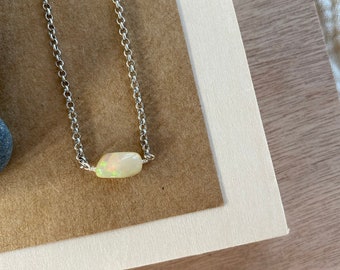 smooth fire opal gemstone necklace in silver.