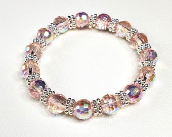 Pink Aurora Borealis Faceted Crystal Glass Stretch Bracelet, a stunning accessory that captures the essence of natural beauty.