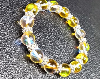 Yellow Moonstone Stretch Bracelet, a stunning accessory that captures the essence of natural beauty.