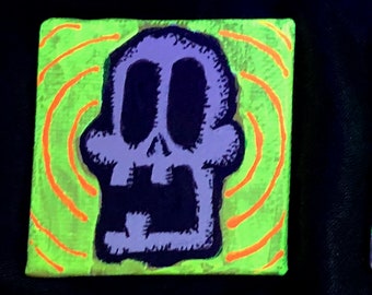 Set of three magnetized glow in the dark Skull Mini-Paintings.