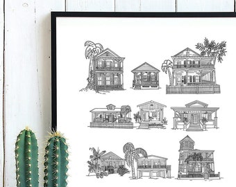 May include: Black and white line drawing print of houses in Key West, Florida. The print is framed in a black frame and is hanging on a white wood wall.
