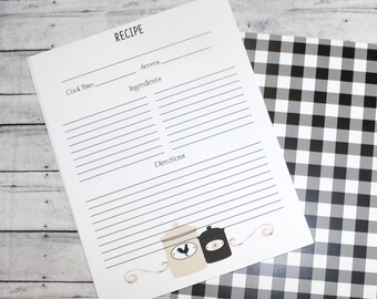 May include: A printable recipe card with a black and white gingham background. The card has lines for writing down the recipe name, cook time, servings, ingredients, and directions. The bottom of the card features a black and white illustration of two jars with a rooster and a flower design.