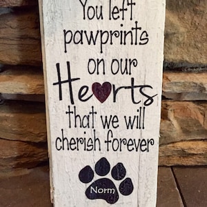 You left paw prints on our hearts that we will cherish forever, Wood sign 12&quot;x 6&quot;.  Custom initials or name in paw print.