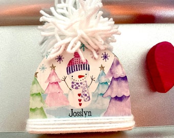 Personalized Wood Beanie/Hat with Pom Pom on top.  Add child’s name.  Boy and girl available. Shelf sitter.  Christmas decor Roughly 3.5”x4”