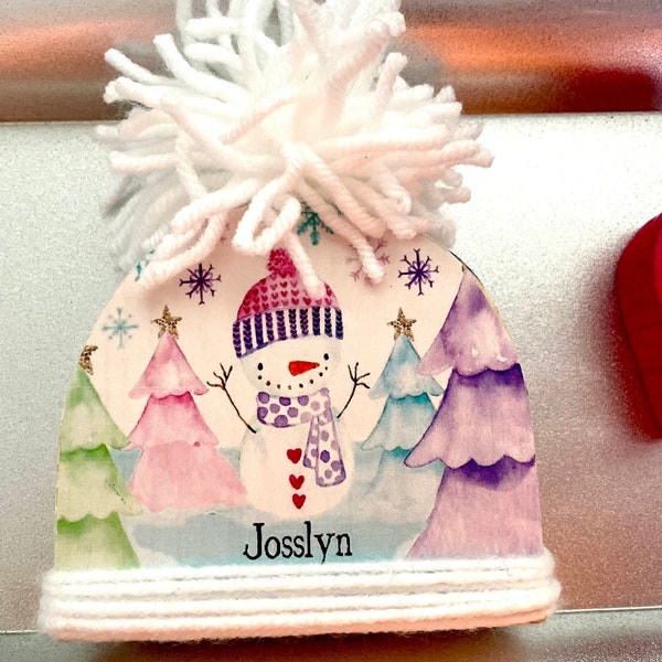 Personalized Wood Beanie/Hat with Pom Pom on top.  Add child’s name.  Boy and girl available. Shelf sitter.  Christmas decor Roughly 3.5”x4”
