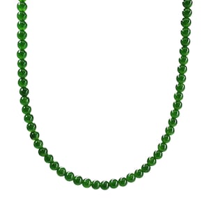 May include: A green jade bead necklace with round beads.