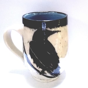Sgraffito Raven Mug: Carved Black Porcelain, Celadon Interior