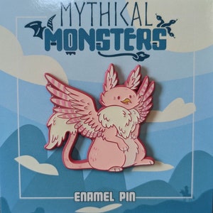 May include: Pink enamel pin depicting a mythical creature with wings, a fluffy tail, and a beak. The pin is displayed against a blue and white background with the text "Mythikal Monsters" and "Enamel Pin".