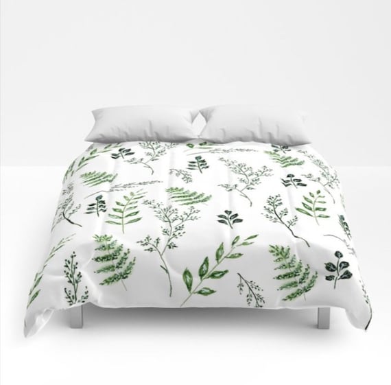 green and white leaf bedding