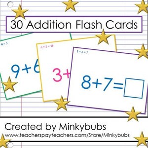 May include: Thirty addition flash cards with colorful borders and white backgrounds. The cards feature simple addition problems with numbers ranging from 1 to 9. The text "9+6", "3+", and "8+7=" is visible on the cards.